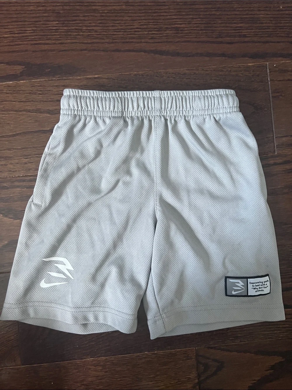 Nike Light Gray Kids Athletic Shorts with White Logos